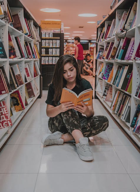 Person reading a book or magazine