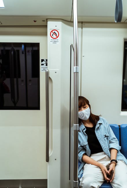 Person sleeping on a train