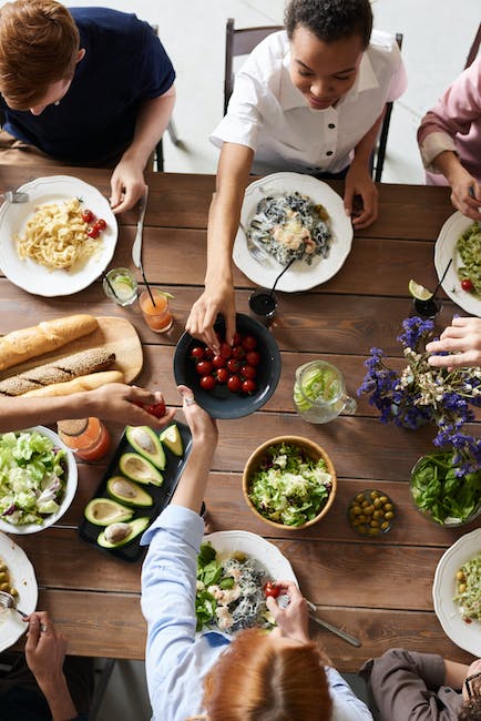 sharing food at communal table