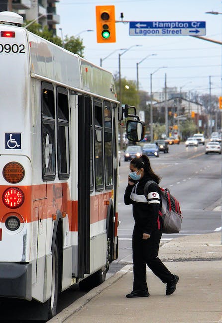 solo traveler making conversation with fellow passenger on bus