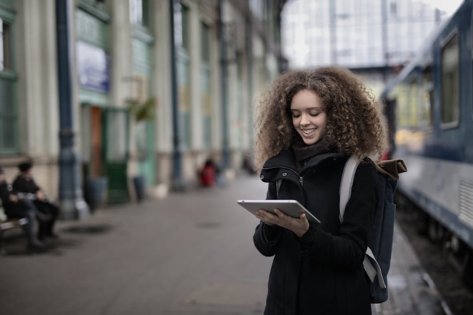 solo traveler using electronic devices